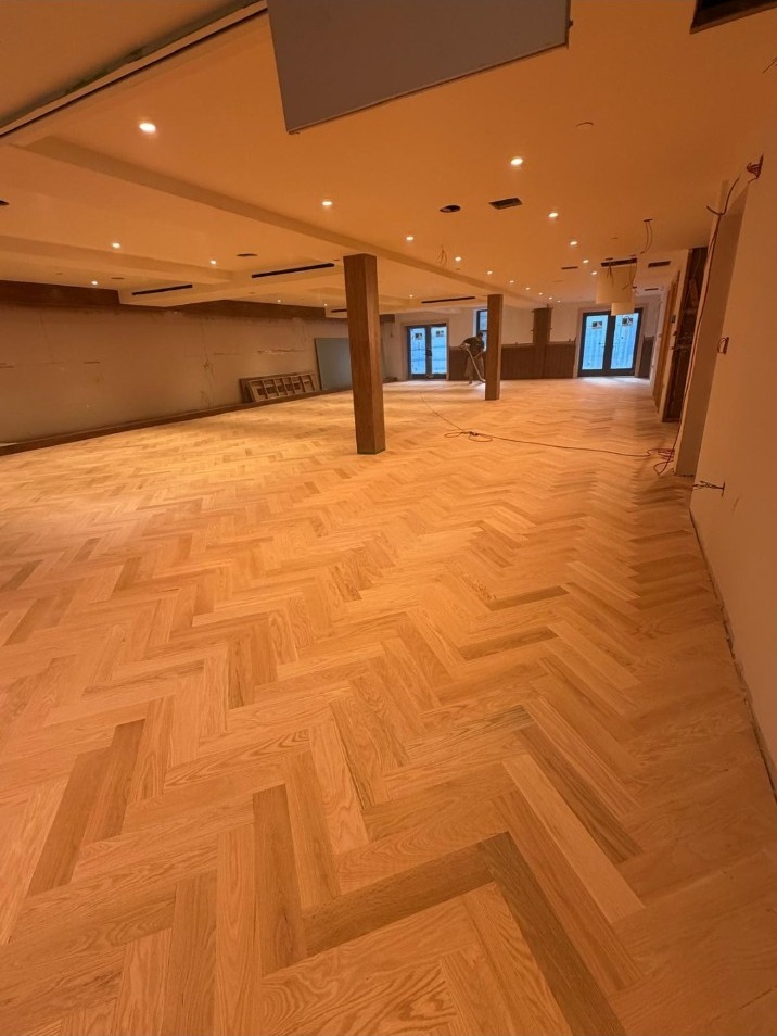 Hardwood patterned floor during a flooring project